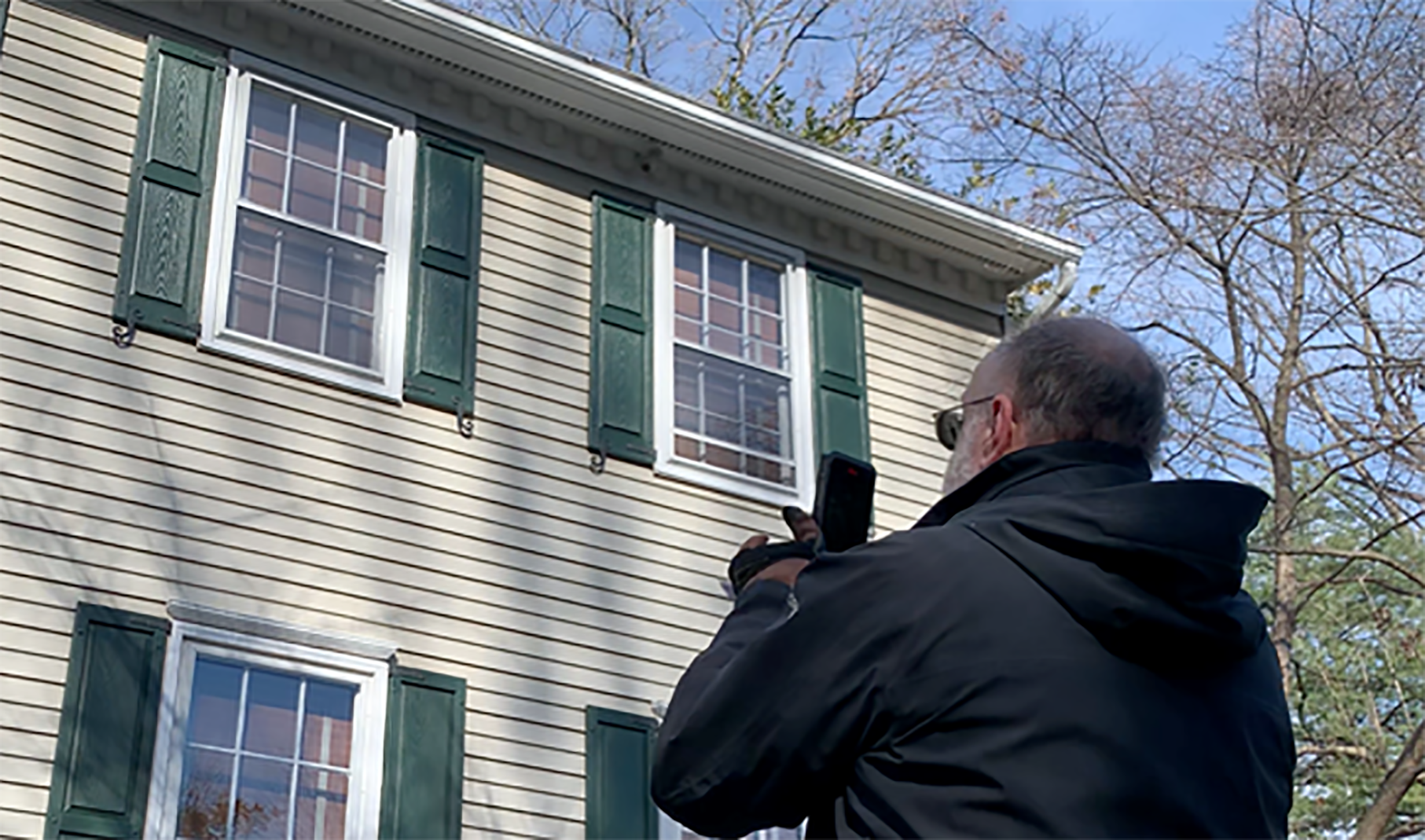 Scott Siegel taking photo of a residential house with the BLK3D